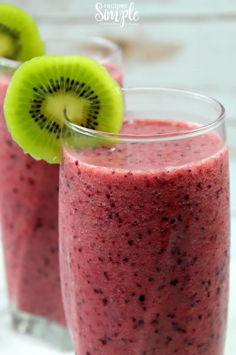 Fruit Smoothies In Plastic Cups With Blueberry, Strawberry, Kiwi